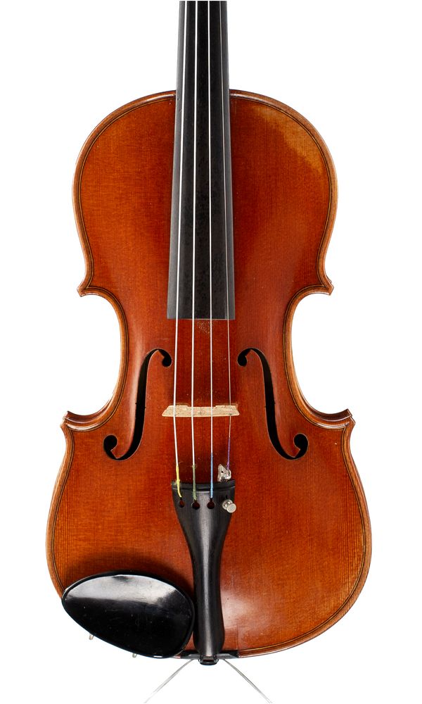 A violin, labelled Romedio Muncher