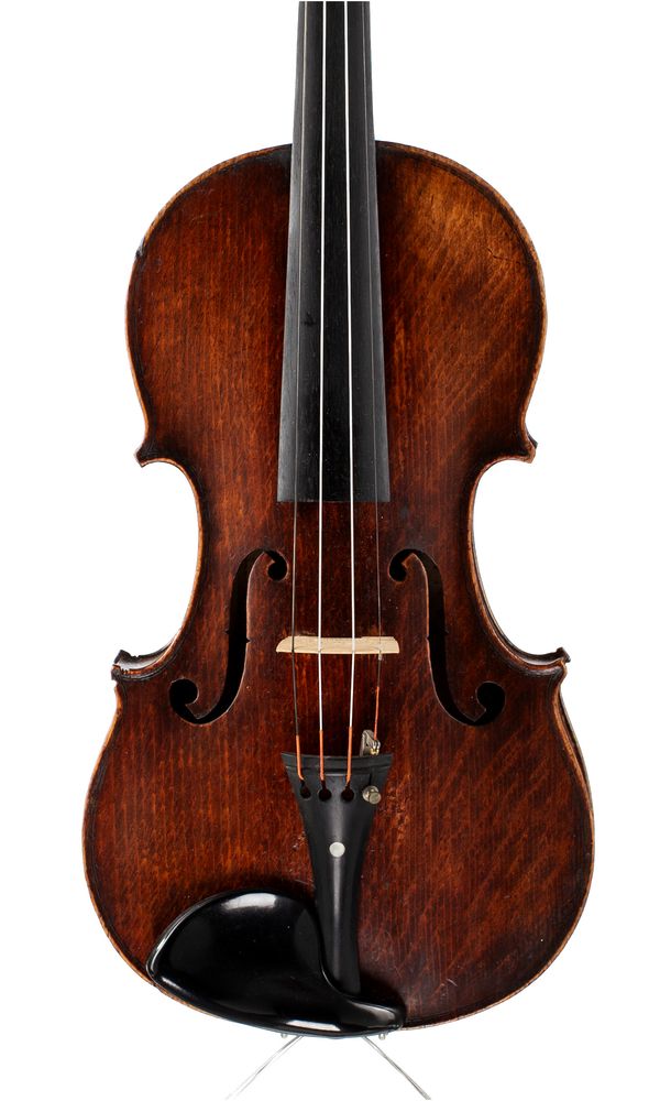 A violin, labelled Medio-Fino