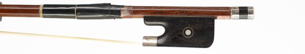 A silver-mounted cello bow, branded Ernest F. Lant