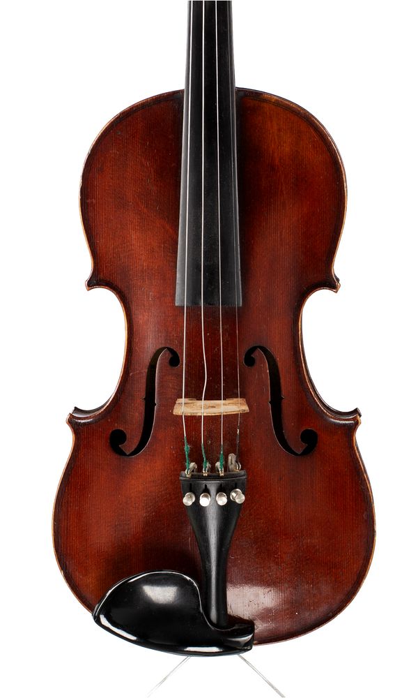 A violin, labelled Medio Fino