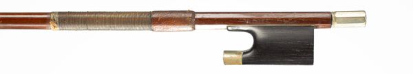 A nickel-mounted violin bow, branded Reisler