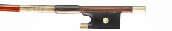 A nickel-mounted violin bow, branded V. Benoit [?]