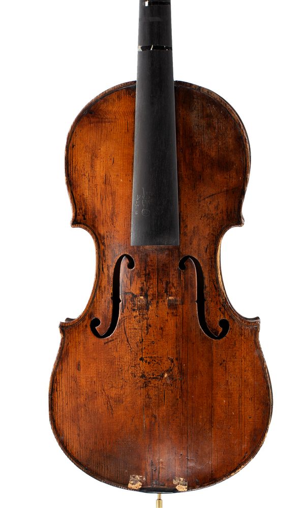 A violin, labelled Repaired by W. H. Gurney German
