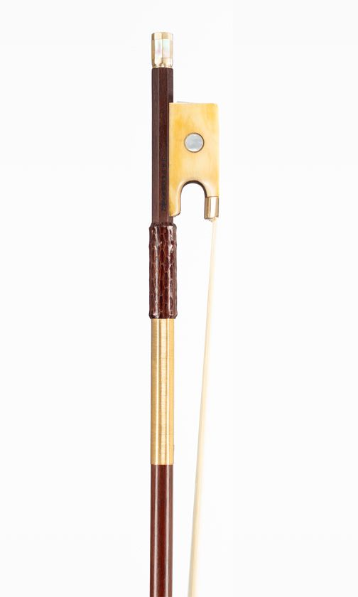 A gold and bone-mounted violin bow, branded Nürnberger
