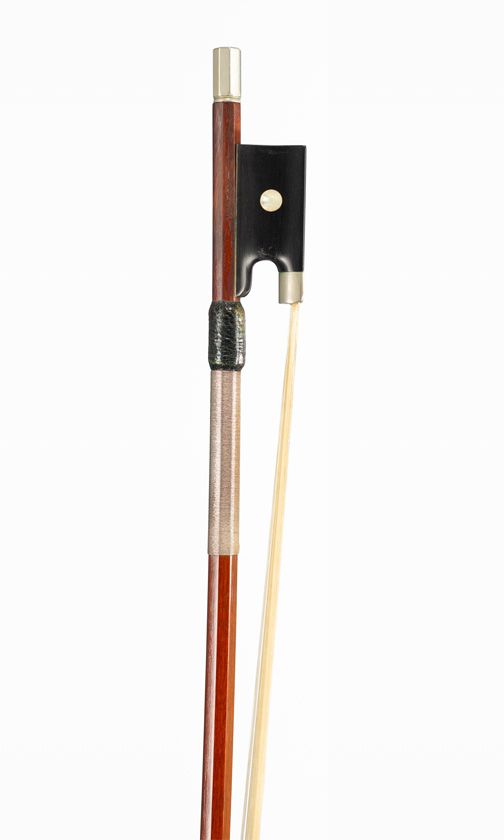 A nickel-mounted violin bow, branded Aug Rau