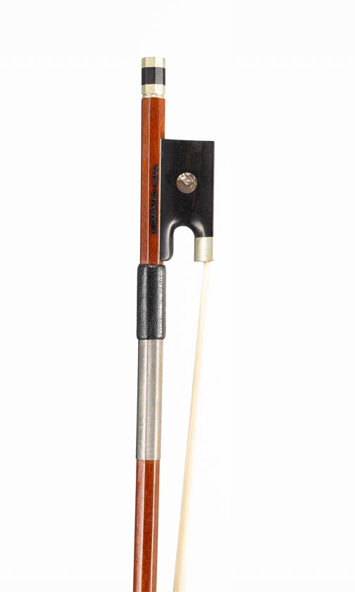 A nickel-mounted violin bow, branded A. Carvalho, Brasil