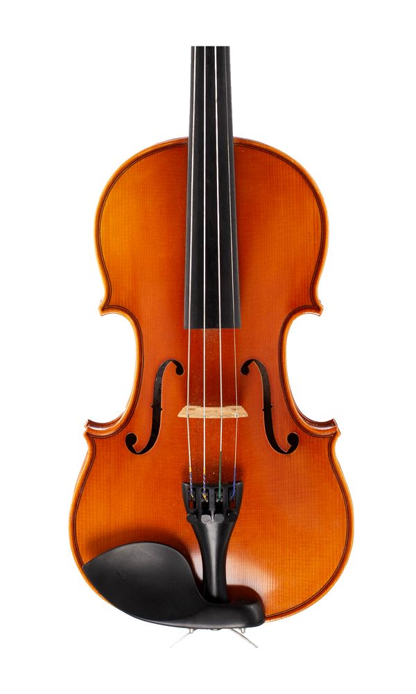 A small violin, labelled Westbury