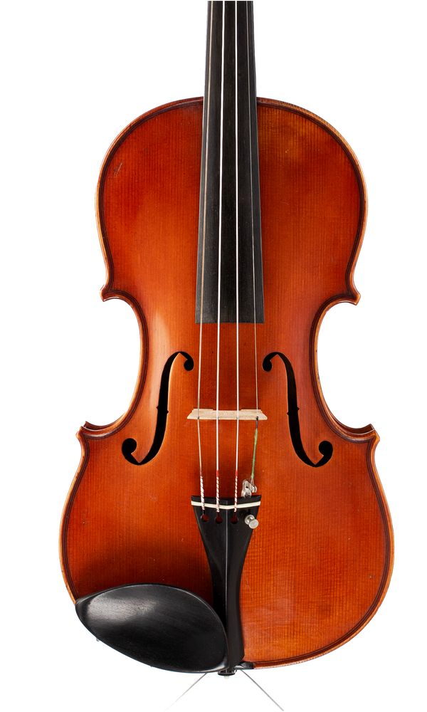 A violin, labelled Renato Scrollavezza  Over 100 years old