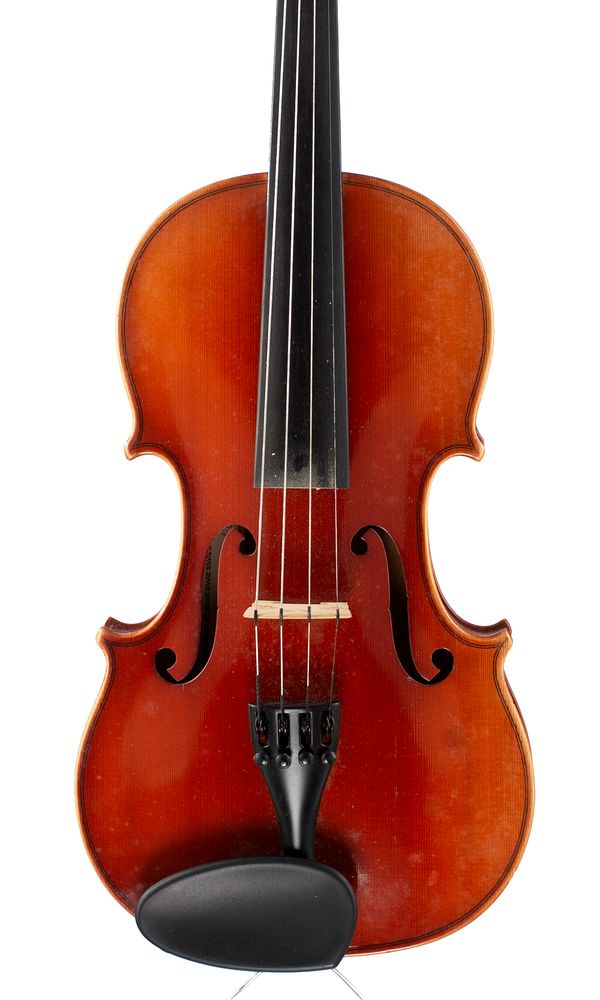 A violin, labelled Andrew Schroetter