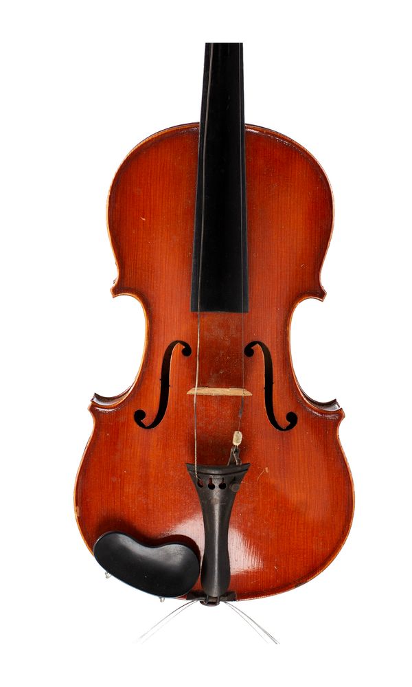 A child-sized violin, labelled Maison du Violon