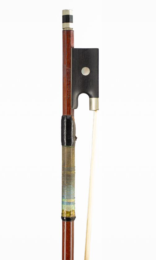 A nickel-mounted violin bow, branded Tourte