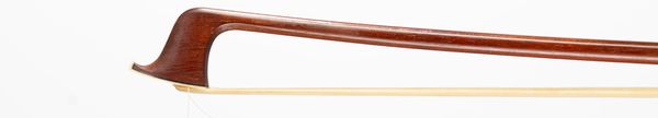 A nickel-mounted violin bow, branded Tourte