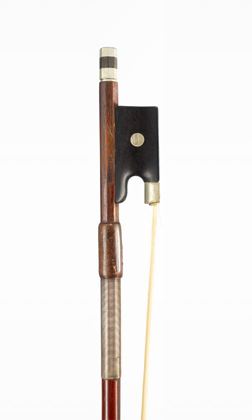 A nickel-mounted violin bow, branded Bausch