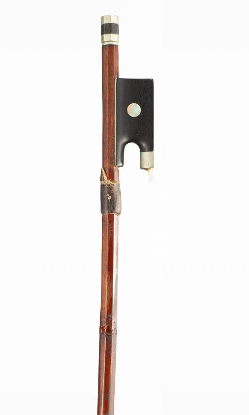 A nickel-mounted violin bow, branded Tourte