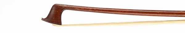 A nickel-mounted violin bow, branded Tourte