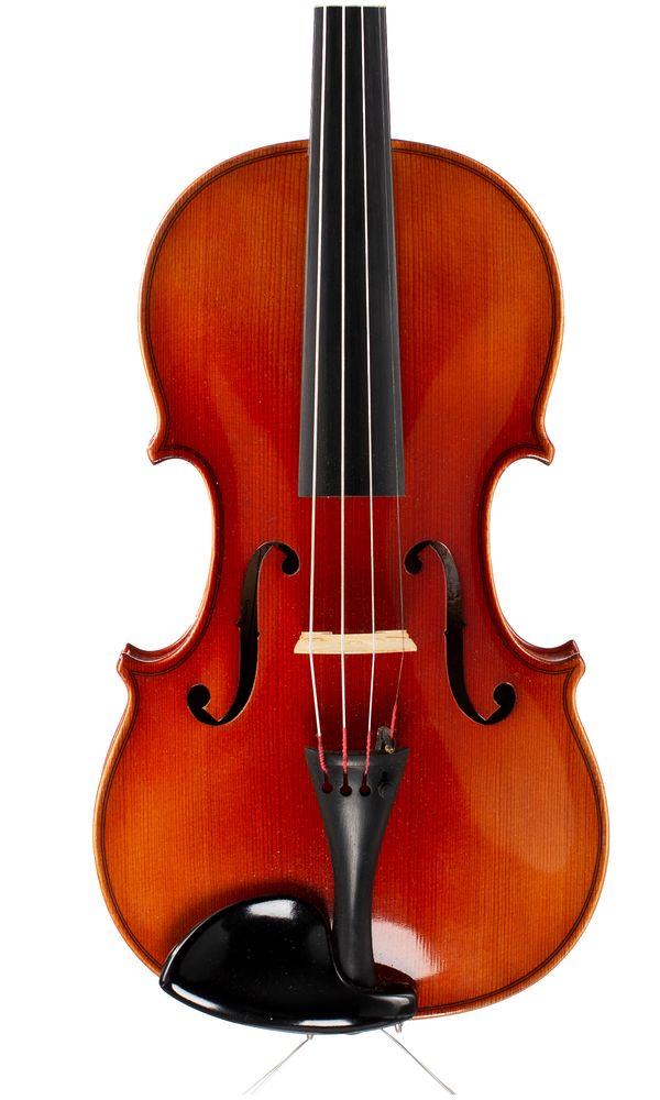 A violin, labelled Karl Hofner