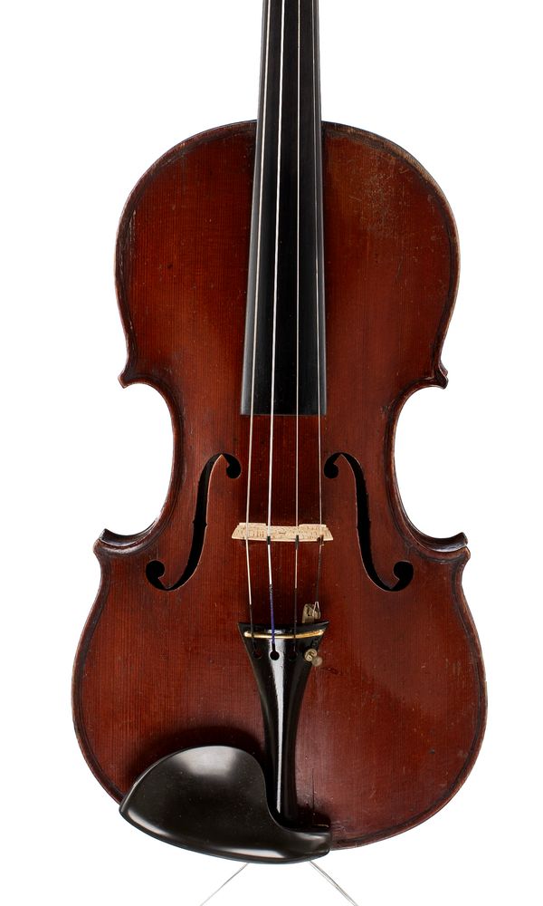A violin, labelled D. Frank & Co., Calcutta