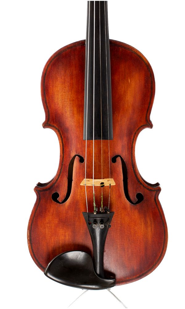 A violin, labelled Maggini Fecit 1924... Exeter