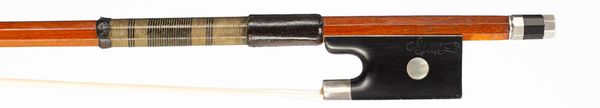 A silver-mounted violin bow, branded Tourte and Gotz [on frog]