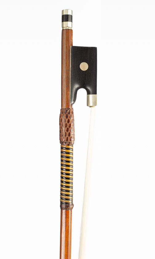 A nickel-mounted violin bow, branded Tourte