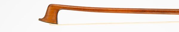 A nickel-mounted violin bow, branded Tourte