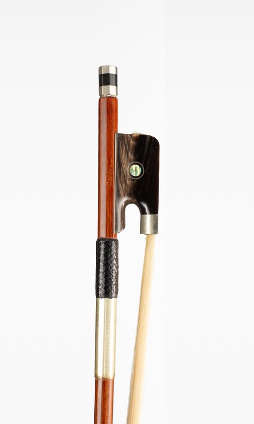 A nickel-mounted cello bow, branded Dacapo