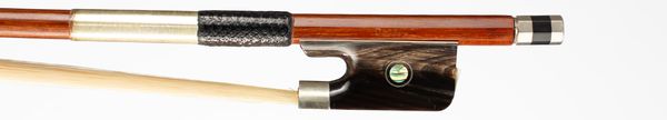 A nickel-mounted cello bow, branded Dacapo