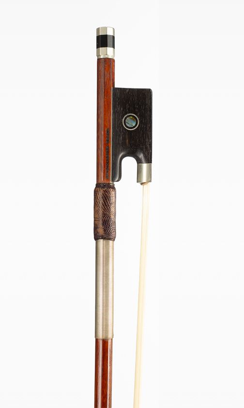A nickel-mounted violin bow, branded Aier Schaeffer Brasil
