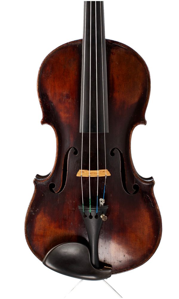 A violin, labelled Martin, London...