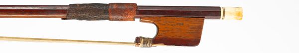 An open-frog exotic wood cello bow by Thomas Tubbs, England, circa 1820