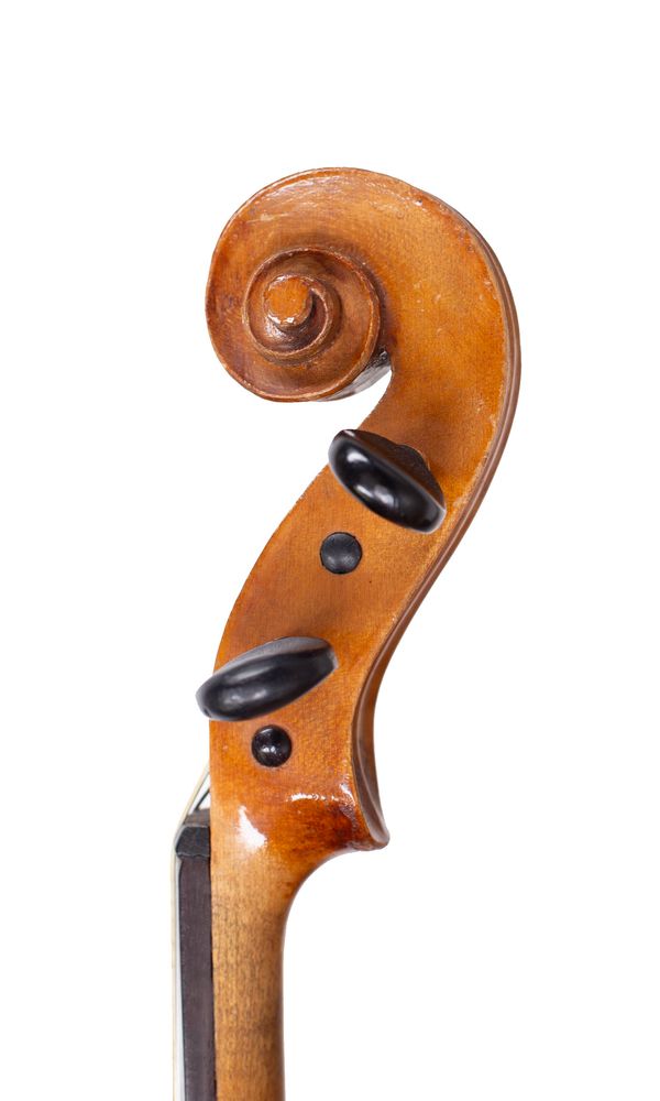 A violin, circa 1900 - scroll