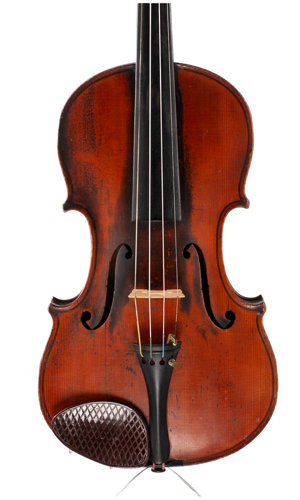 A violin, labelled Nicola Genari