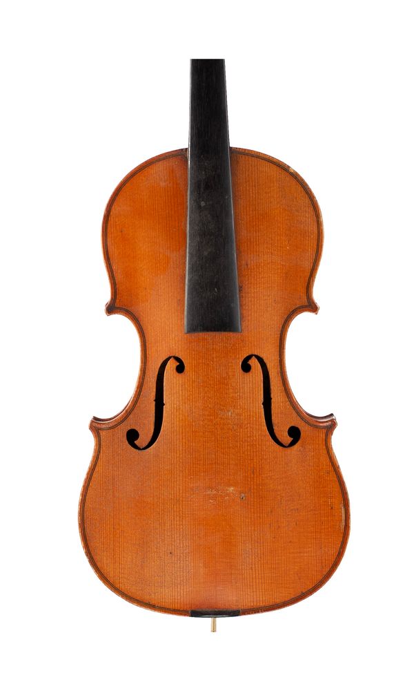 A small violin, labelled Breton Brevete