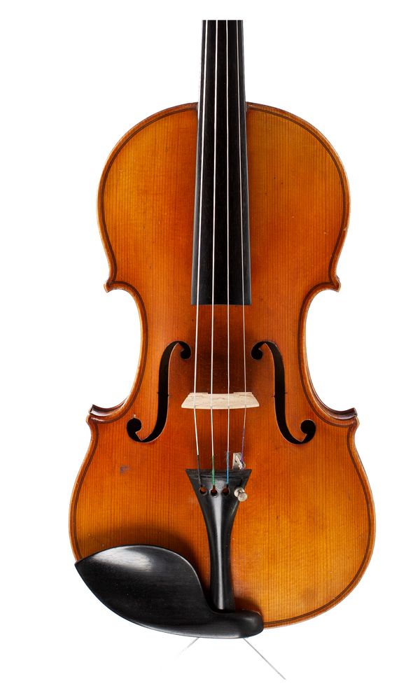 A three-quarter sized violin and a one-quarter sized violin