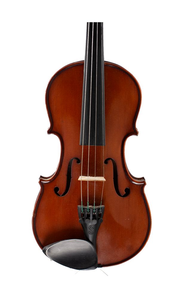 A half-sized violin, labelled The Stentor Student