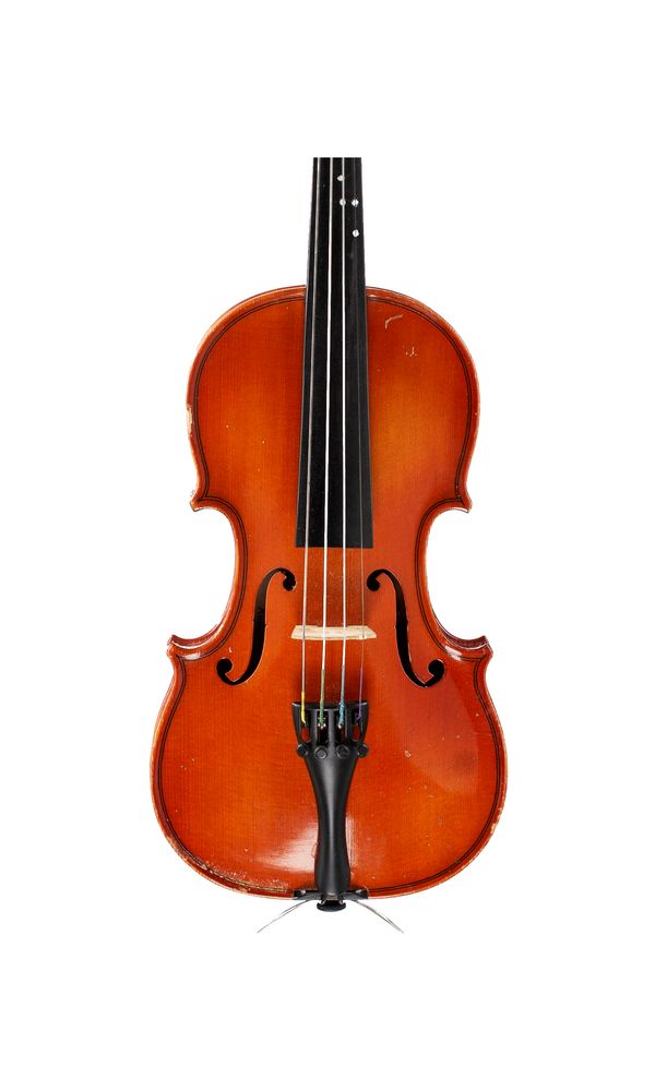 A child-sized violin, labelled Franz Kirschnek