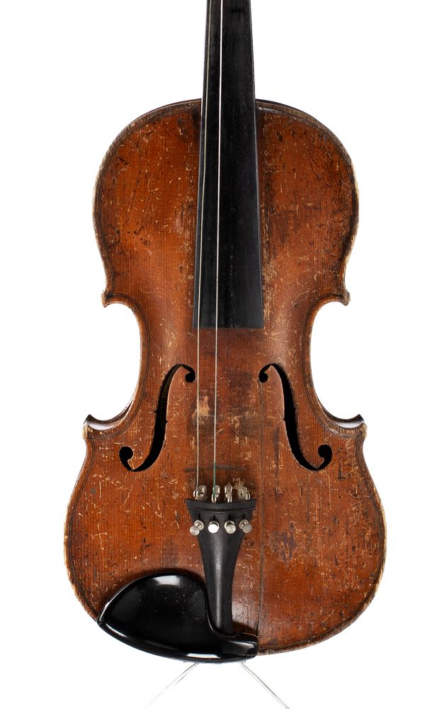 A violin, labelled Leslie Sheppard