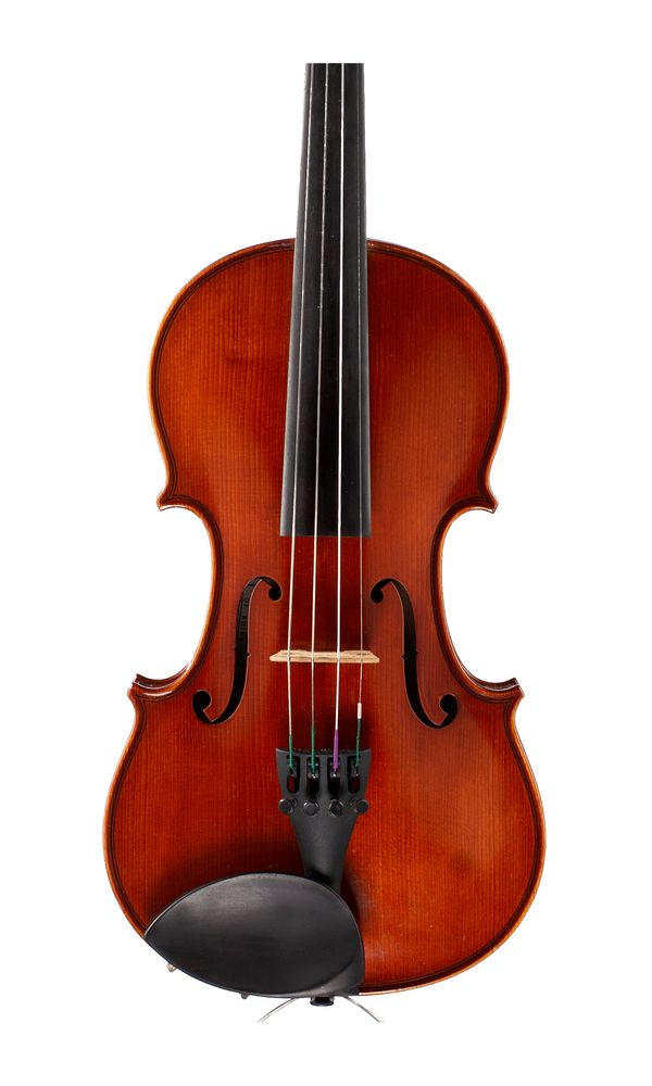 A small violin, labelled Stringers of Edinburgh