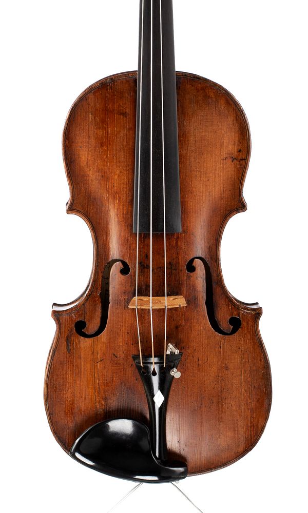 A violin, bearing a repairer's label