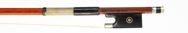 A nickel-mounted violin bow, branded Alfons Riedl