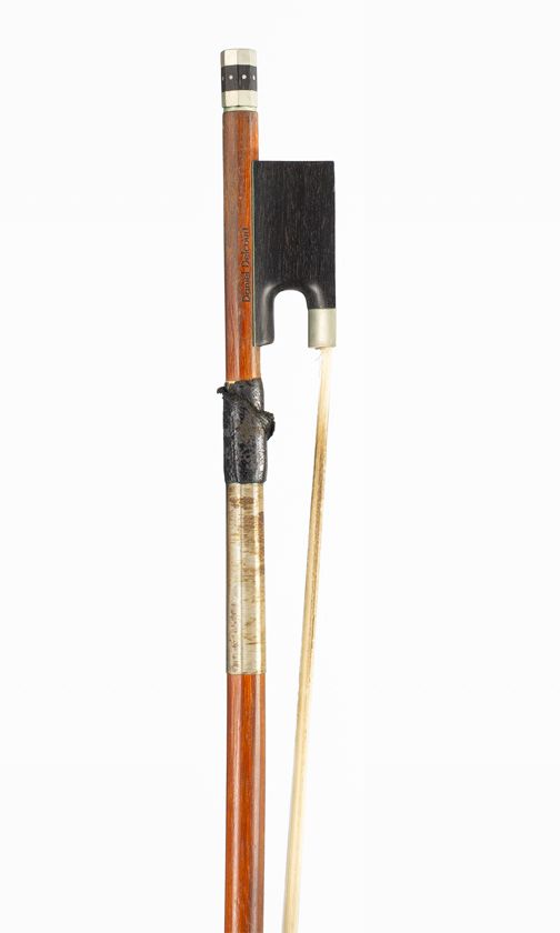 A nickel-mounted violin bow, branded Daniel Delcourt