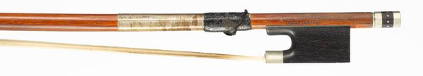 A nickel-mounted violin bow, branded Daniel Delcourt
