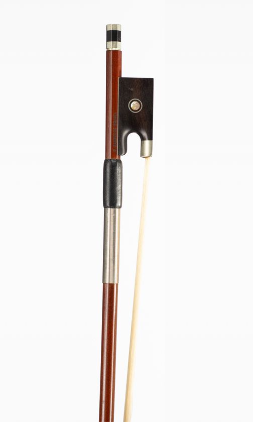 A nickel-mounted violin bow, branded T. Pampolin Brasil