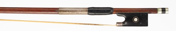 A silver-mounted violin bow, branded [illegibly]