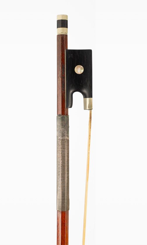 A nickel-mounted violin bow, branded Arnold Voigt