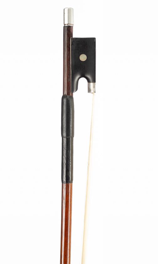 A silver-mounted violin bow, branded Staccato