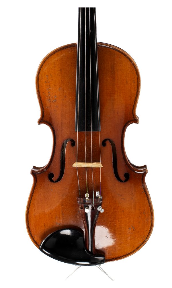 A three-quarter sized violin, labelled Imported by Leslie Sheppard