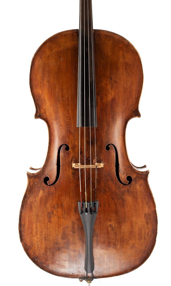 A cello, labelled Maximus Nigl