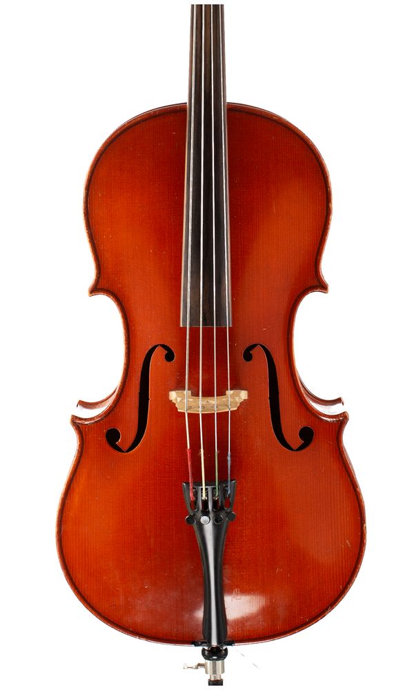 A cello, labelled Karl Herrmann