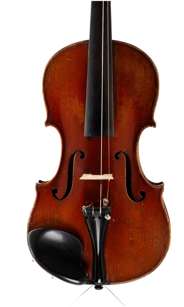 A violin, labelled Joseph Guarnerius  Over 100 years old